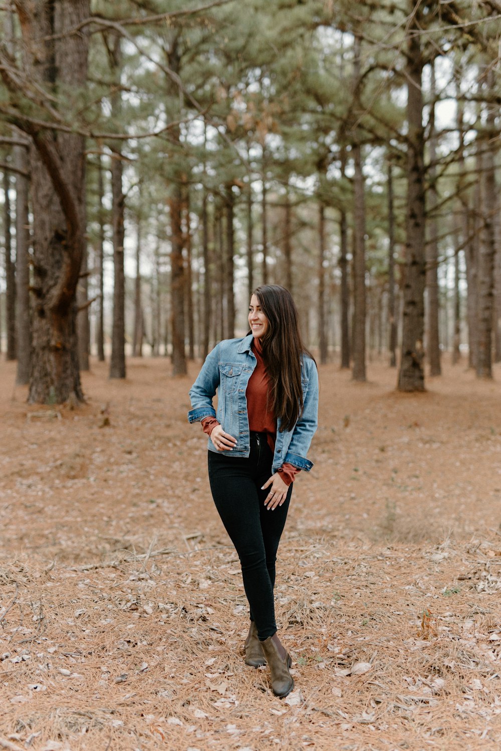 a person standing in a forest