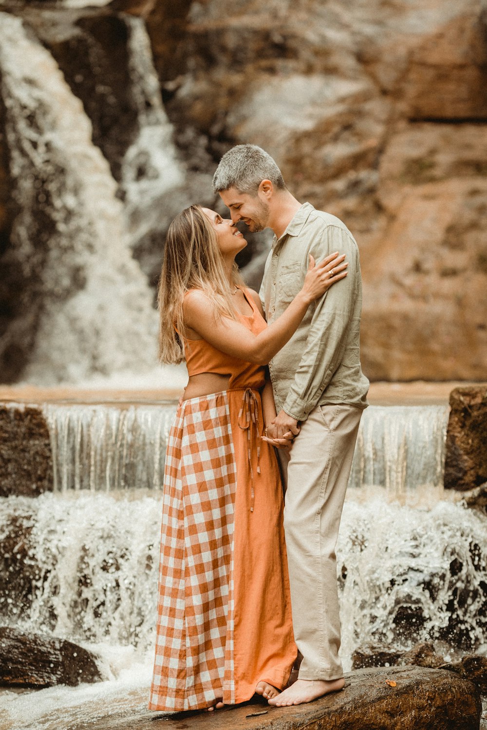 a man and woman kissing