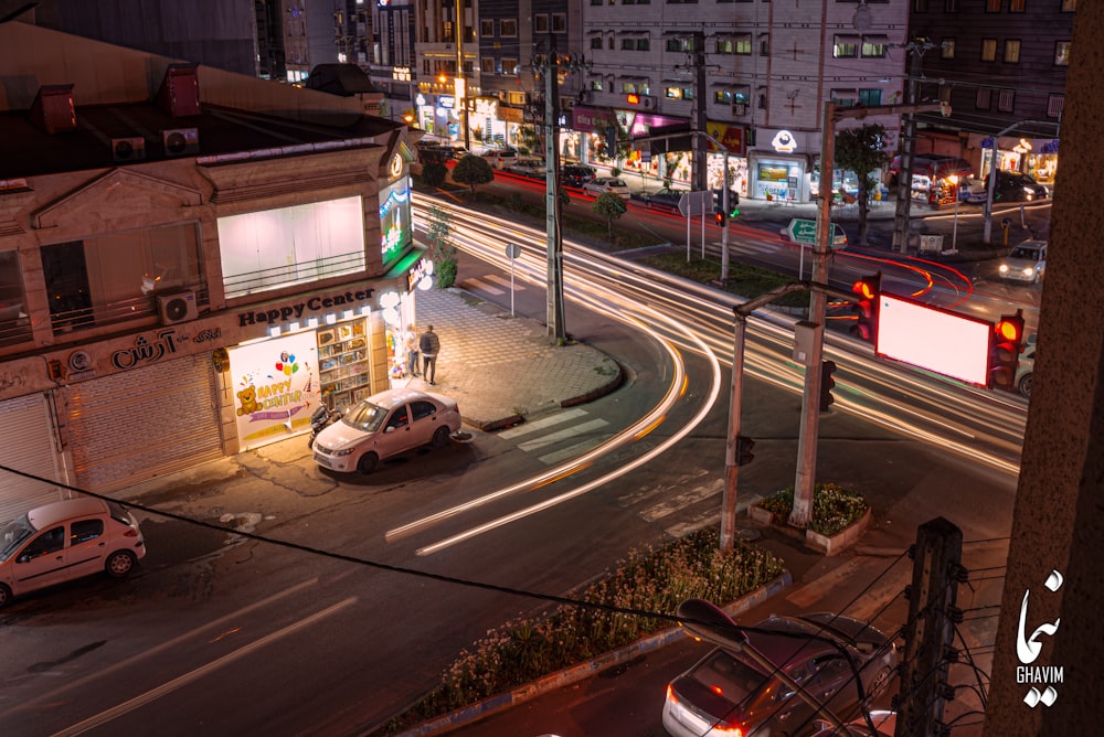 a street with cars and buildings