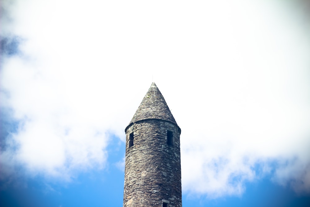 a tall tower with a blue sky