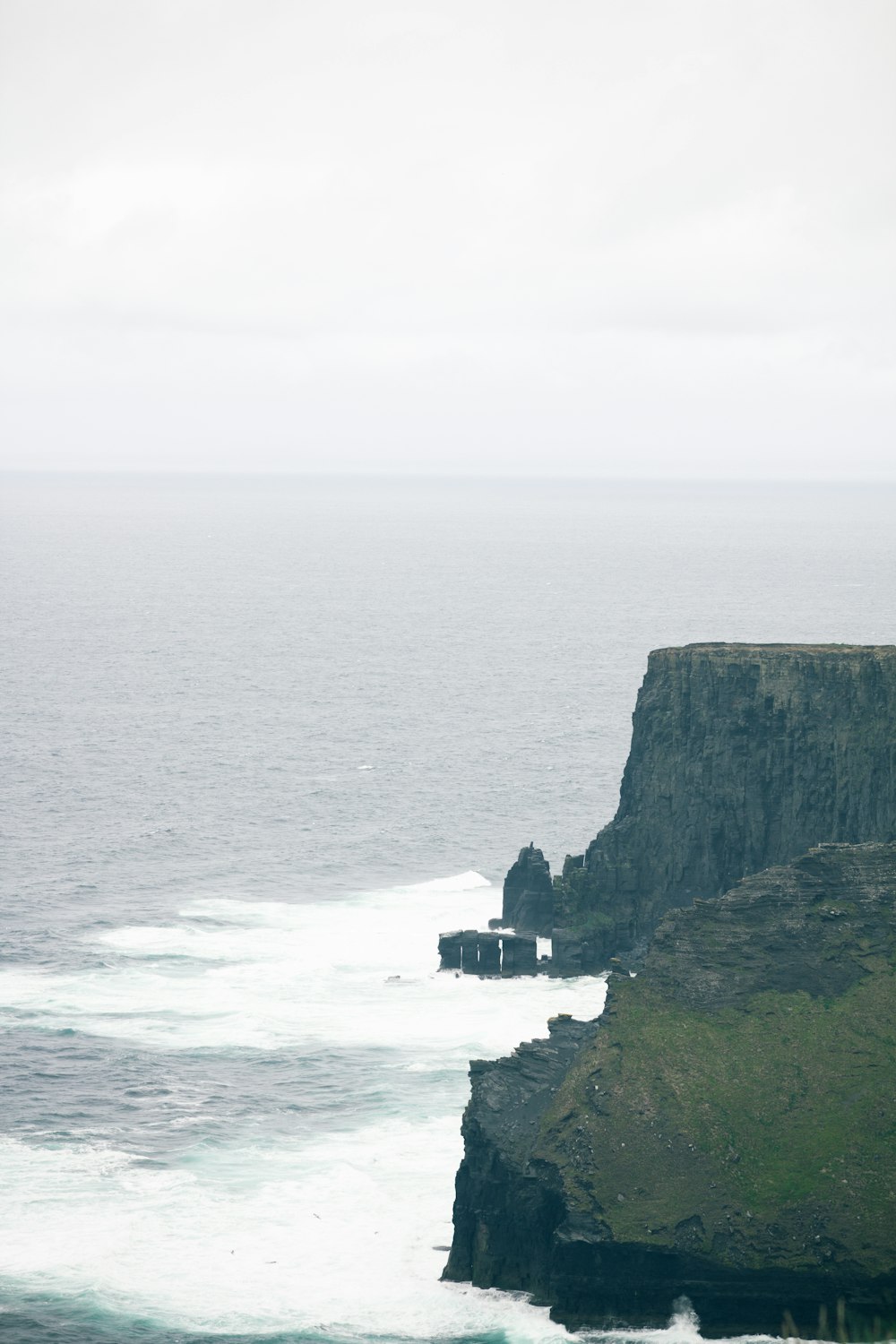 a cliff with a building on it