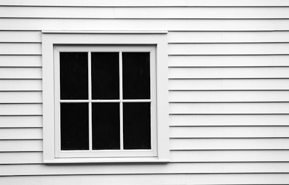Energy-efficient vinyl replacement windows installed by Golden Hammer Construction