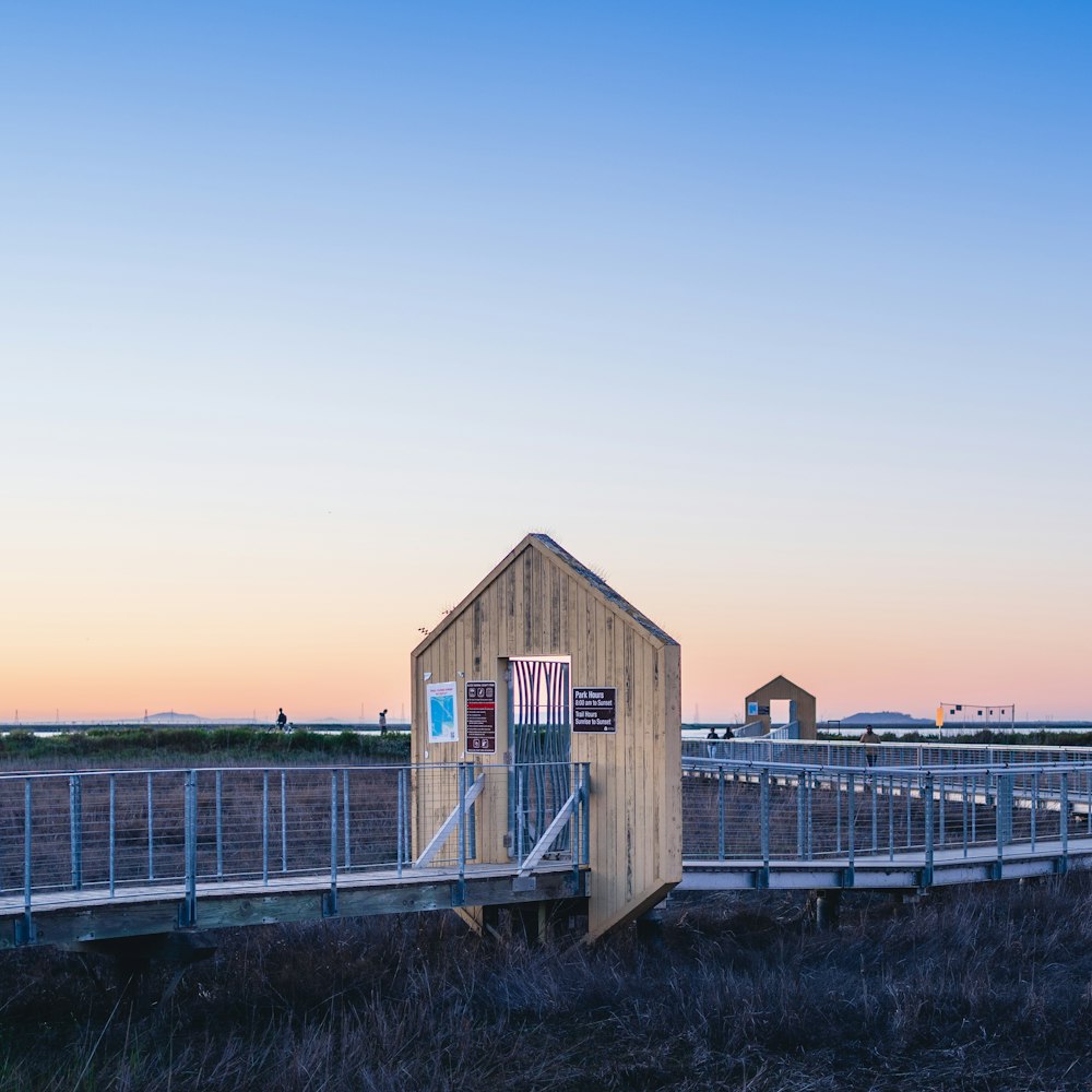 a wooden building on a dock