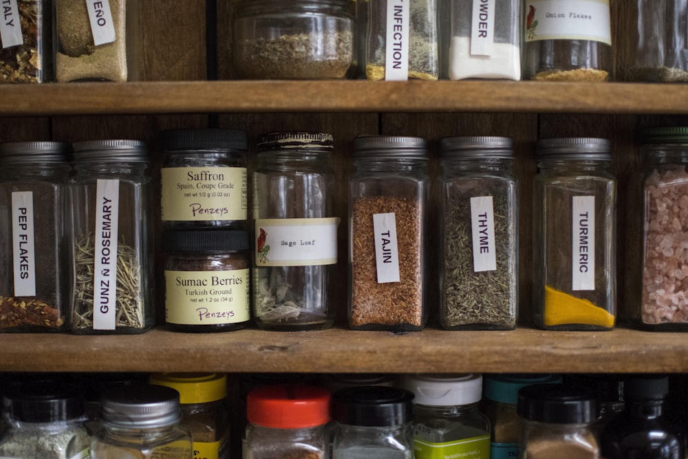 a shelf with jars of food on it