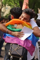 a man holding a woman