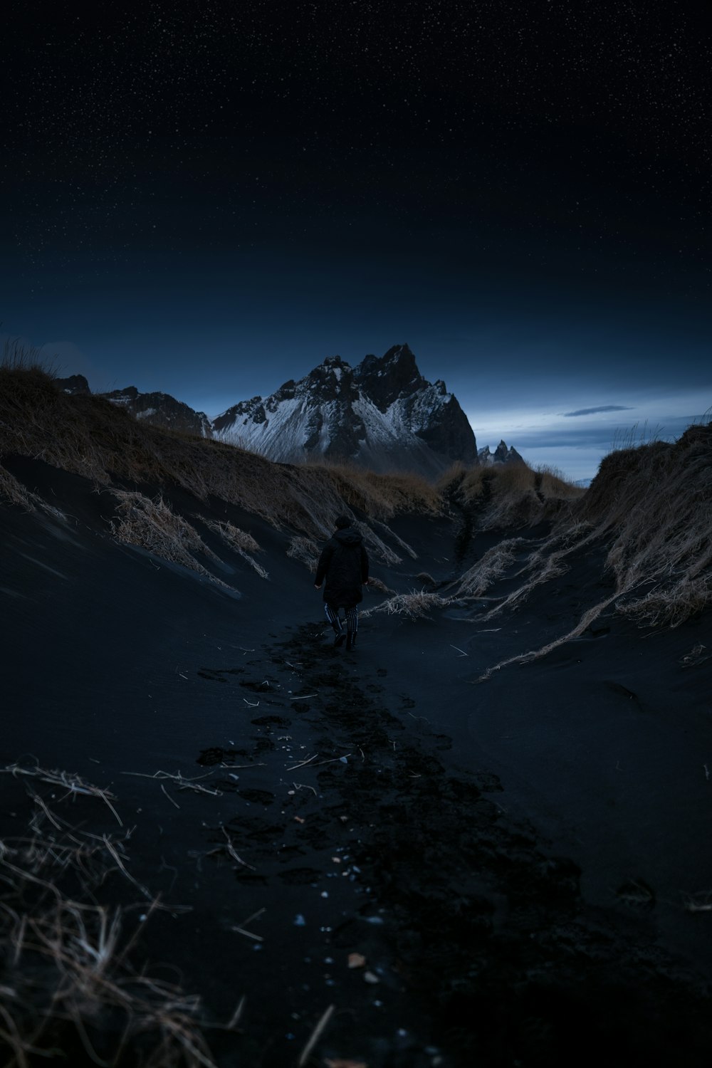 a person walking on a snowy path