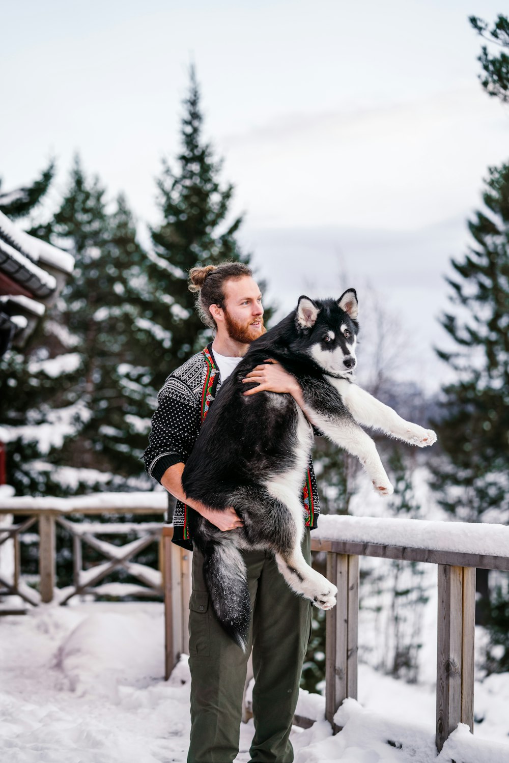 a person holding a dog