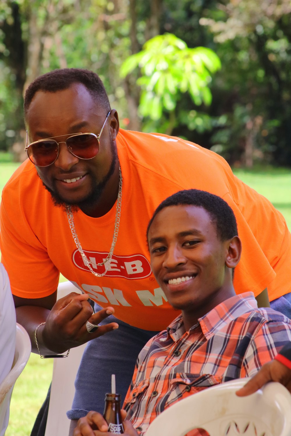 a man and a boy smiling