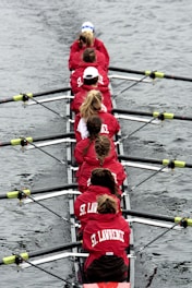 a group of people rowing