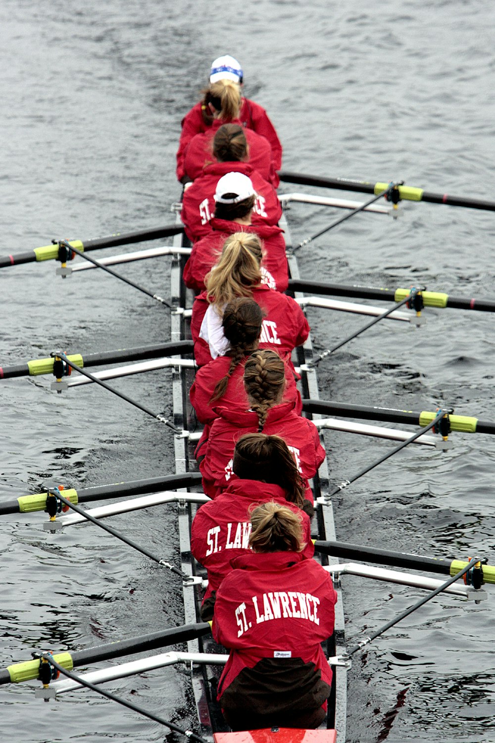 a group of people rowing