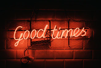 a sign on a brick wall