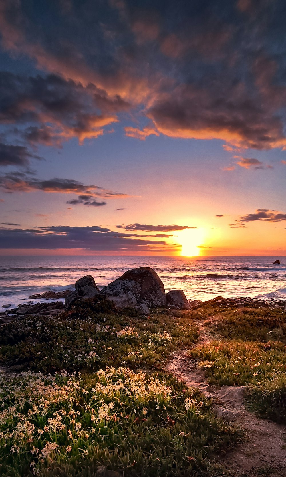 a sunset over a beach