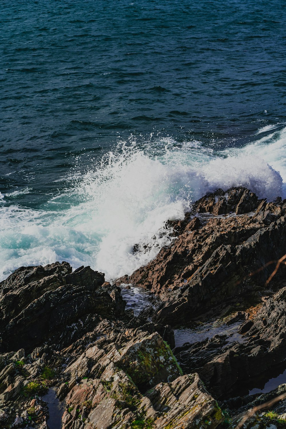 waves crashing on rocks