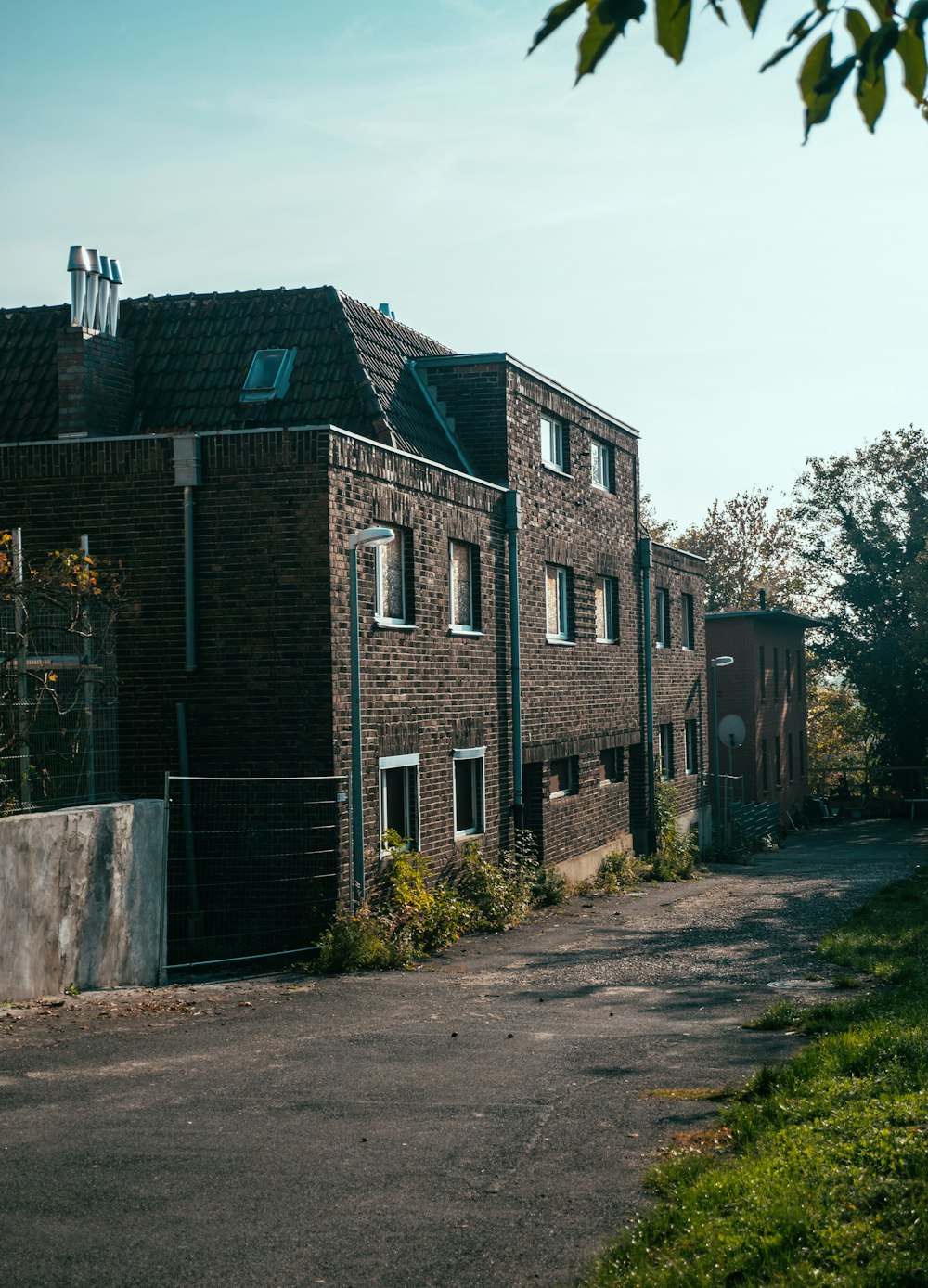 a brick building with a gate