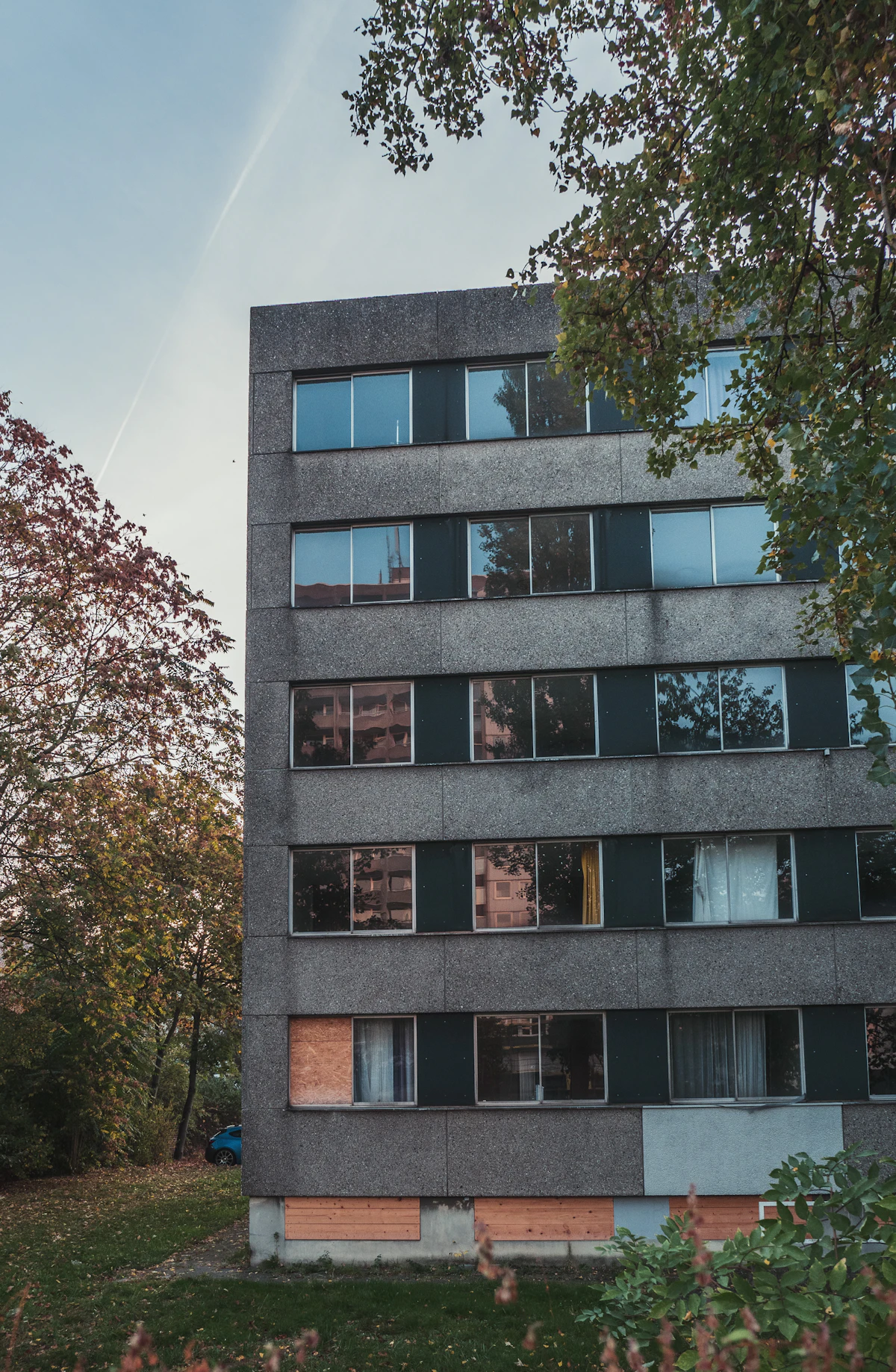 Apartment building against a bright sky