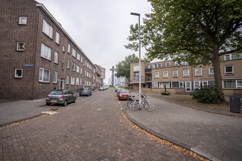 a street with cars and buildings on the side