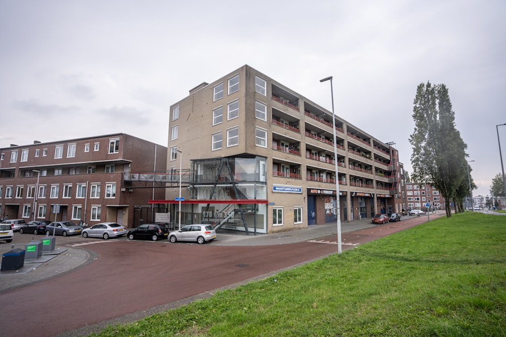 a building with cars parked in front