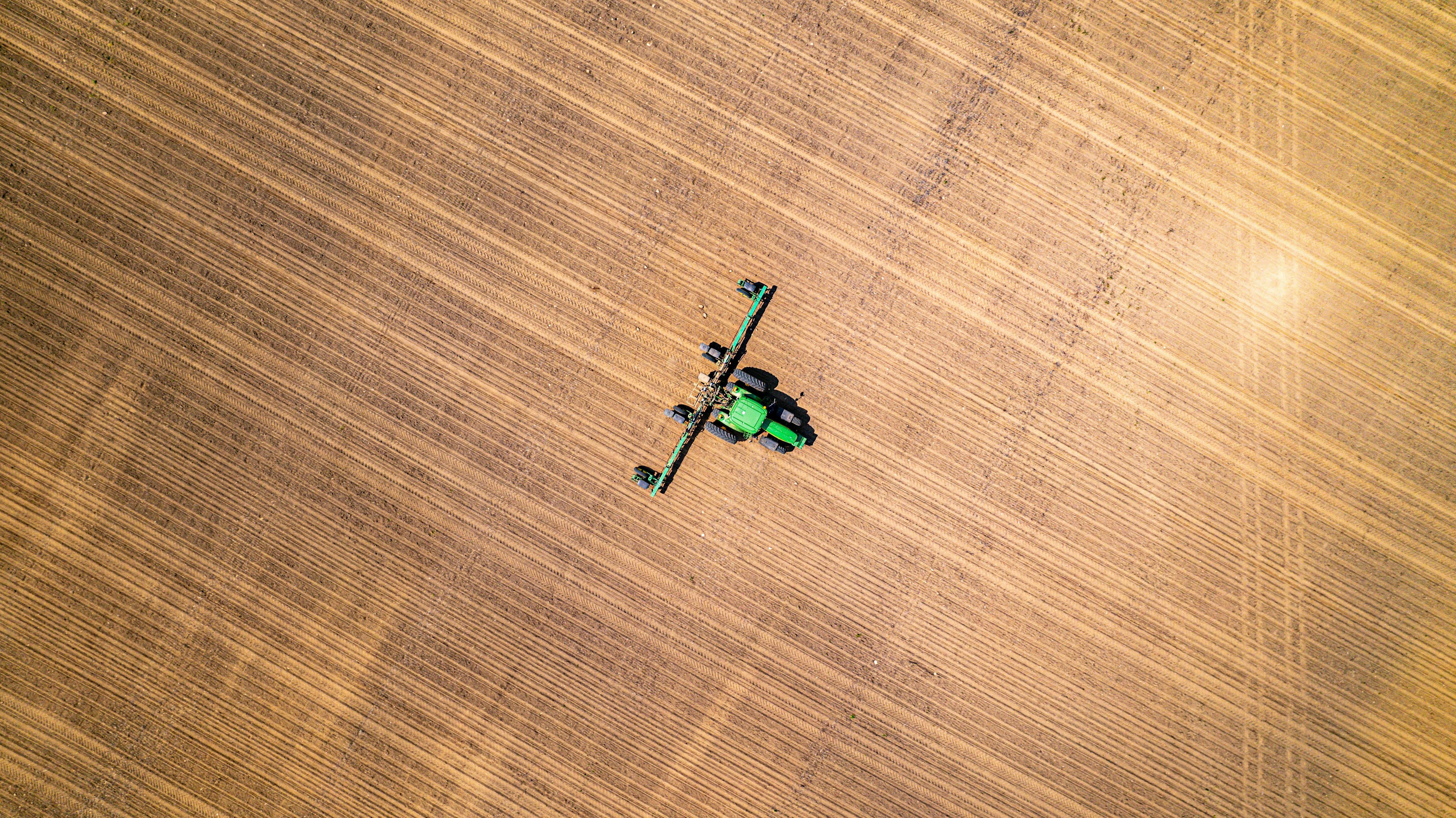Planting male row corn in a field in Southwest Michigan.