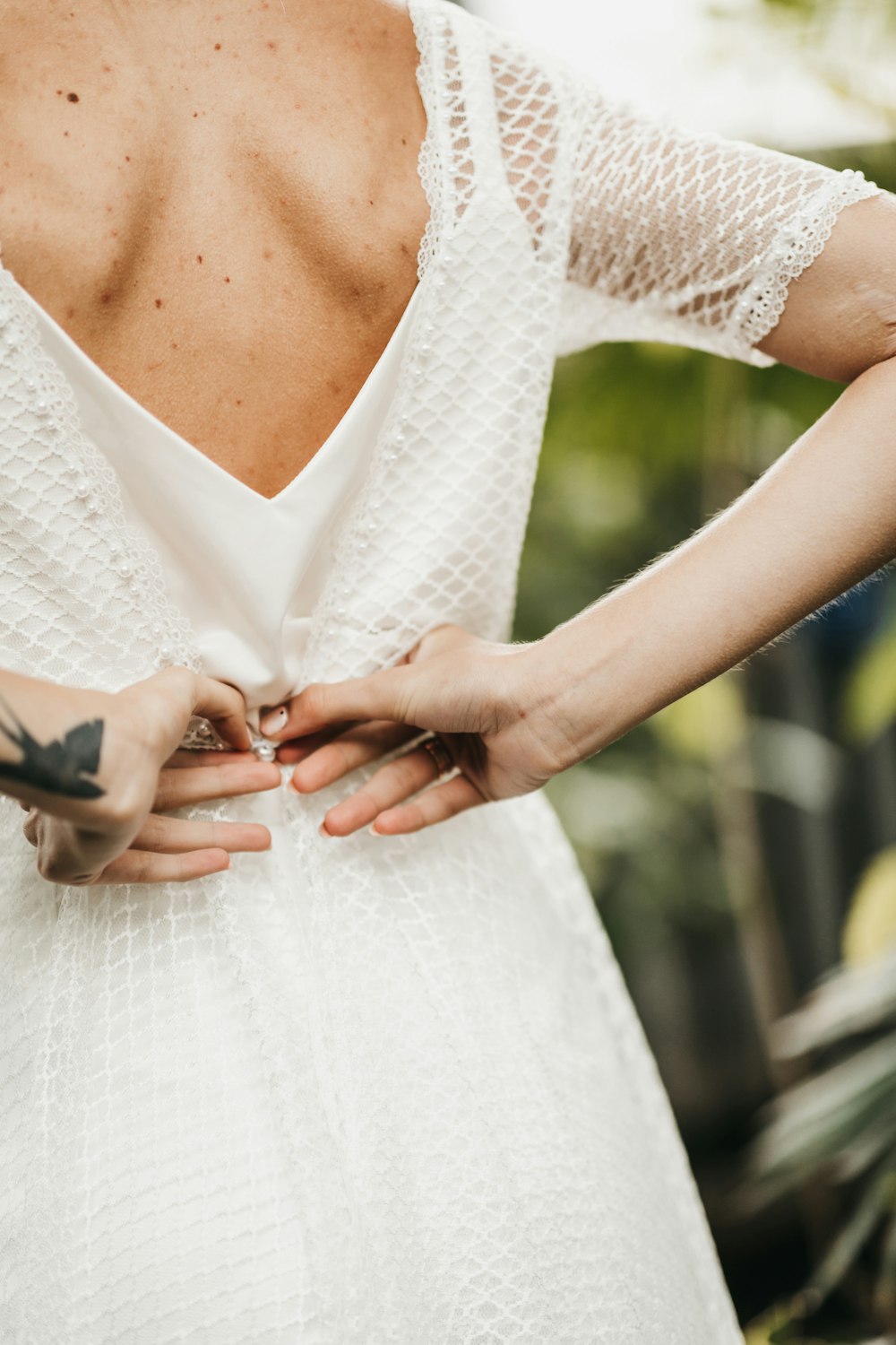 a woman holding her hands together