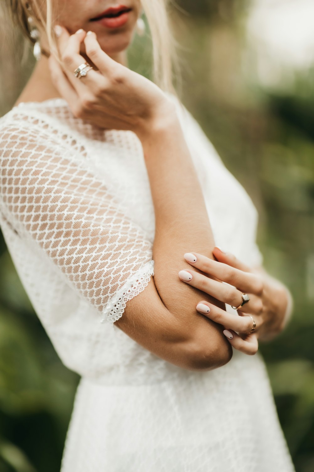 a woman holding her hands together