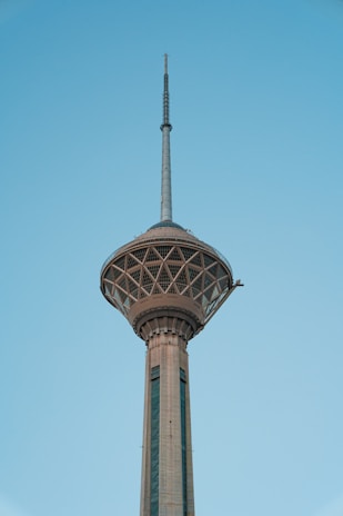 a tall tower with a circular top