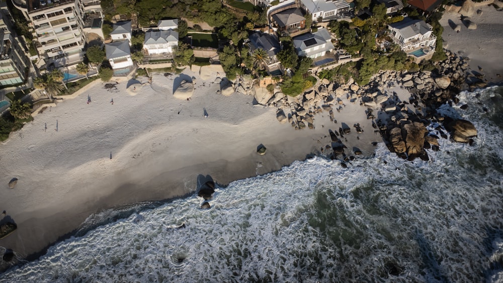 a beach with houses and trees