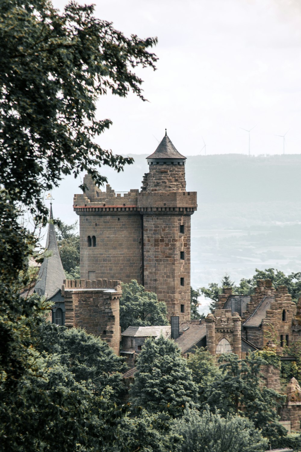 a stone castle with a steeple