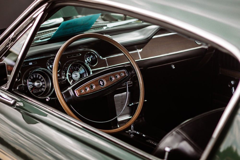 the steering wheel and dashboard of a car