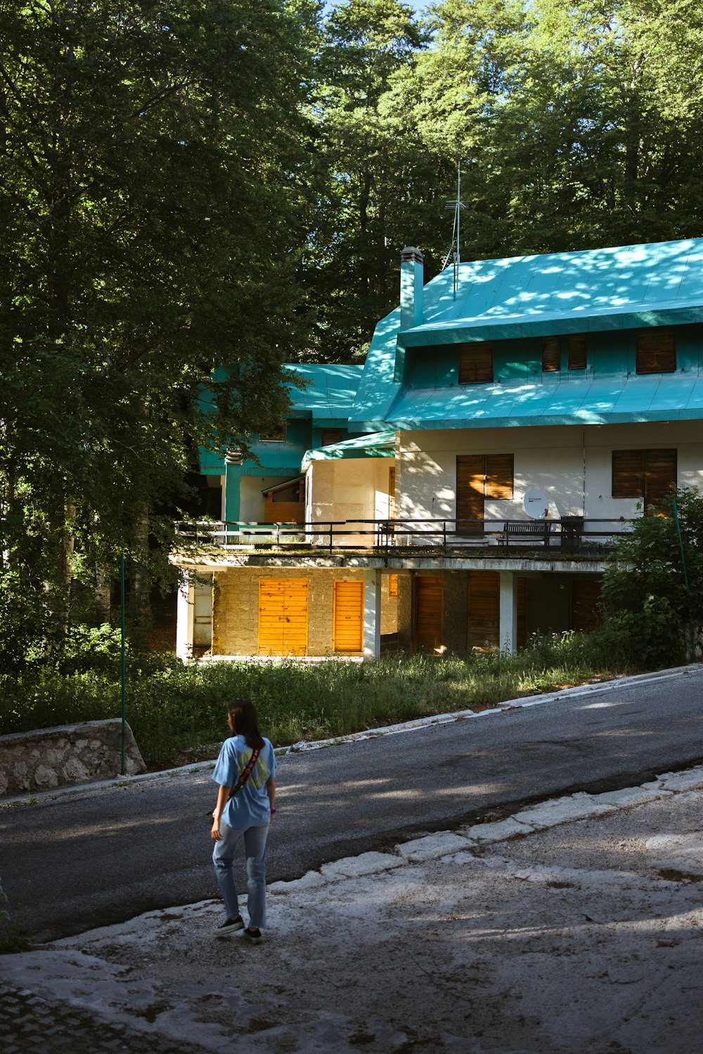 a man walking on a road