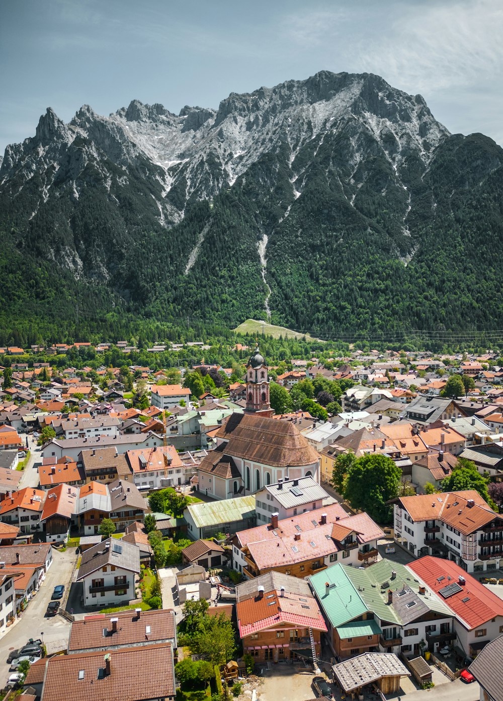 a town in front of a mountain