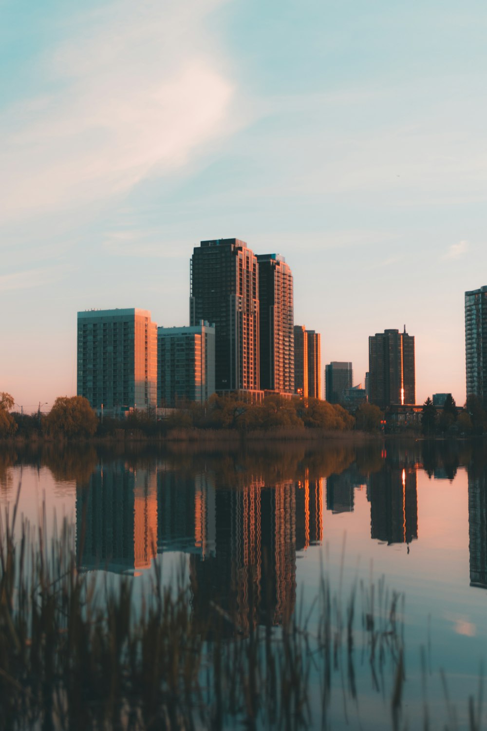 a city skyline reflected in water