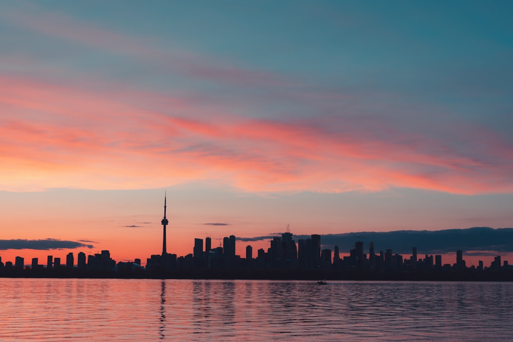 a city skyline at sunset