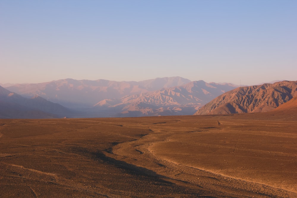 a desert landscape with mountains