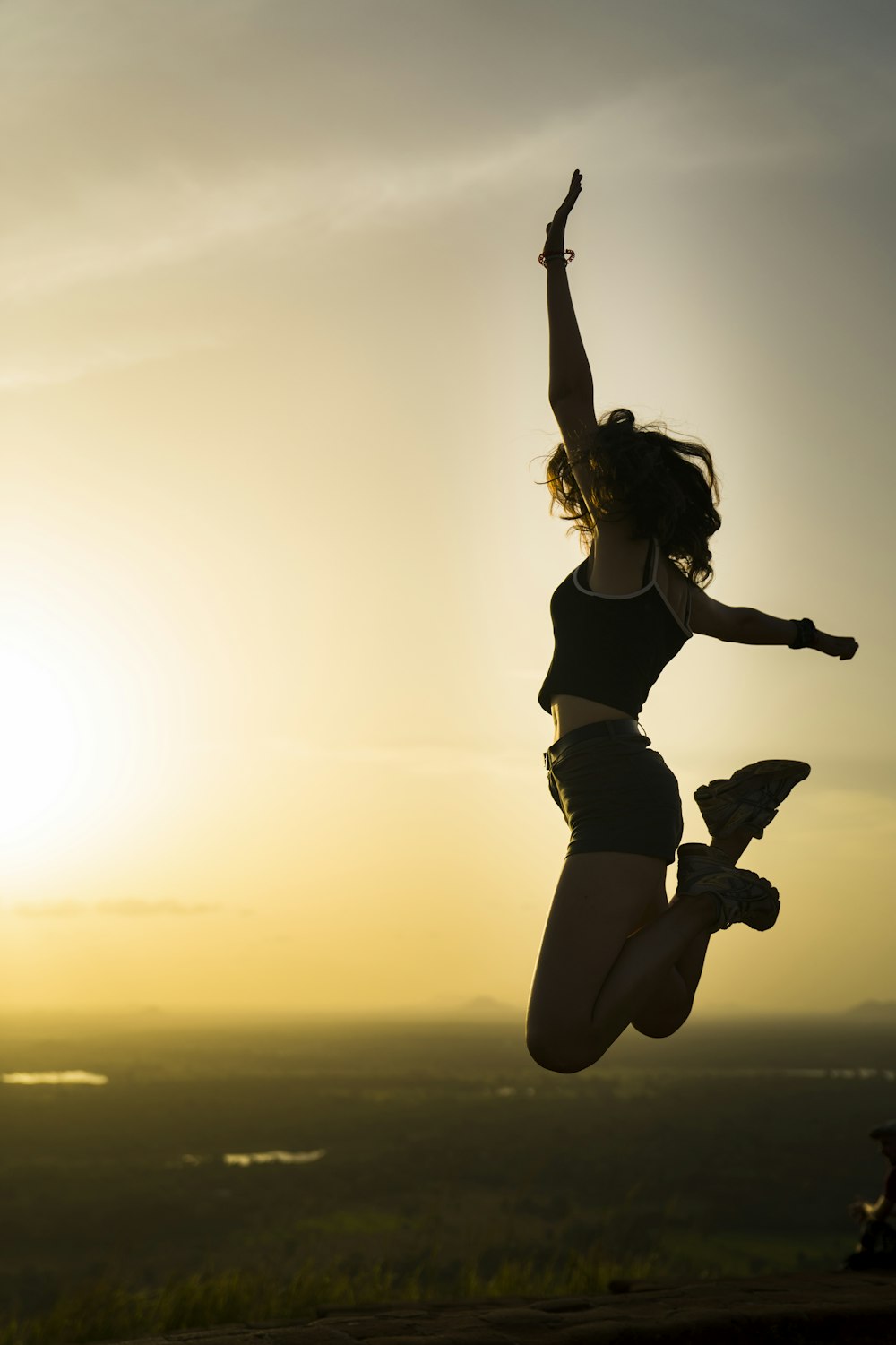 a woman jumping in the air