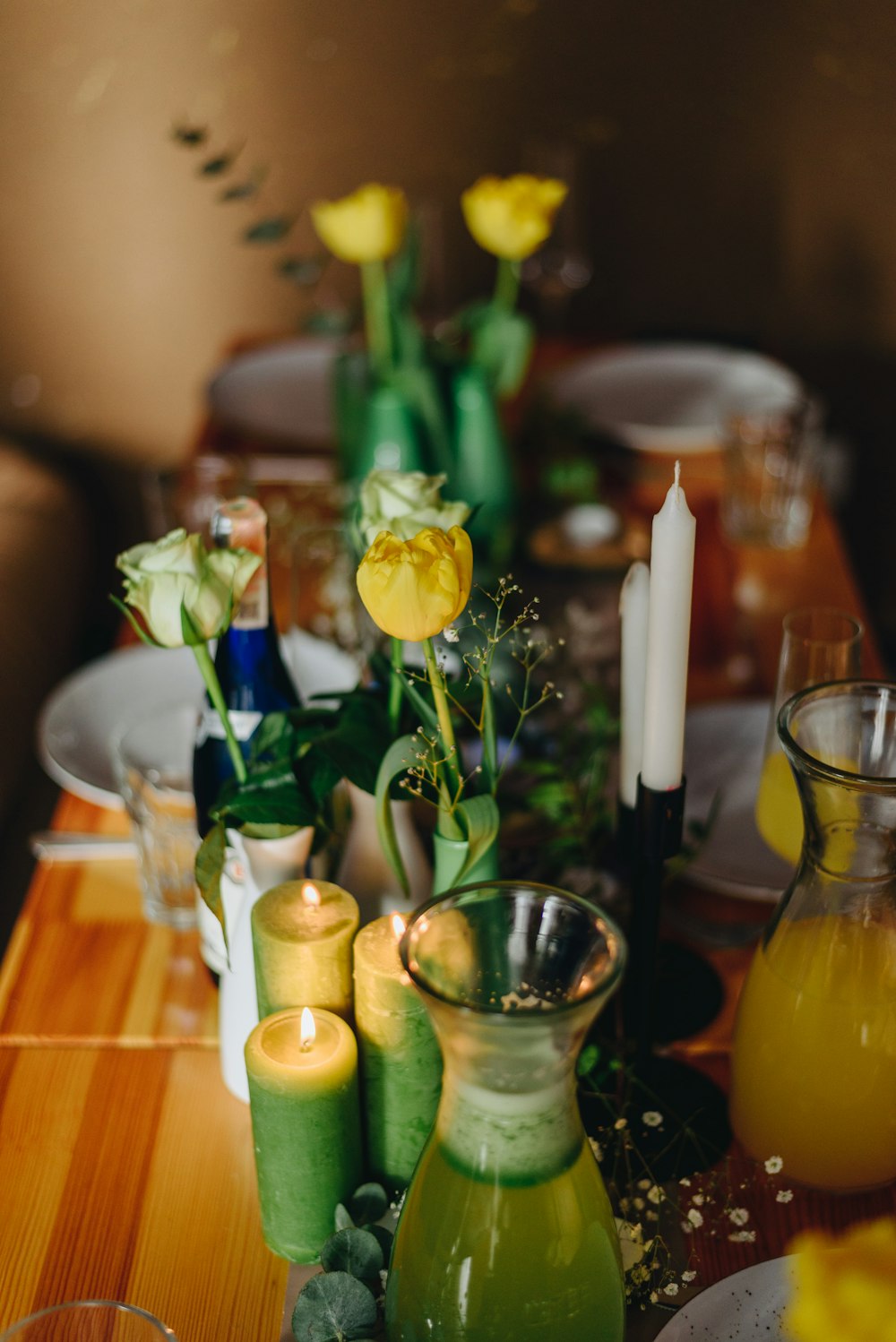 a vase with yellow flowers