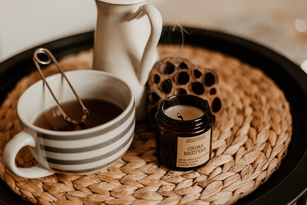 a basket with cups of coffee