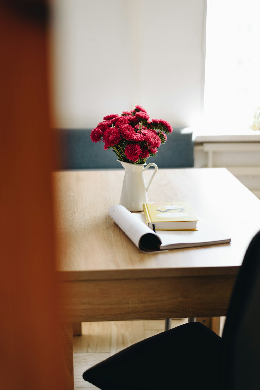 a vase of flowers on a table