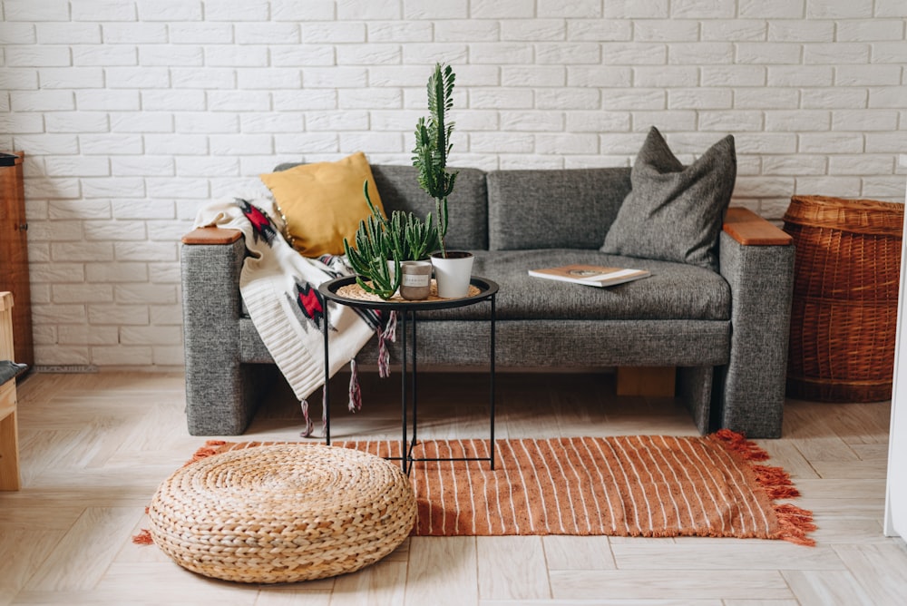 a couch with a table and chairs