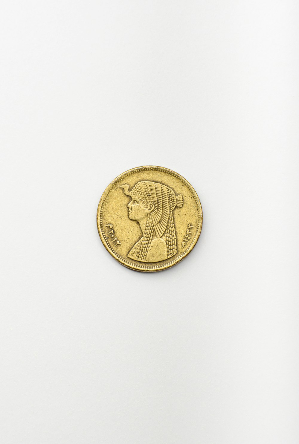 a coin with a design on it