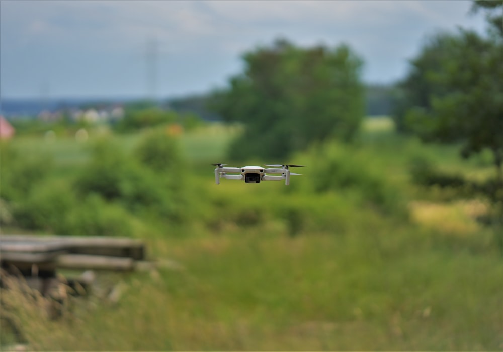 a drone flying over a field