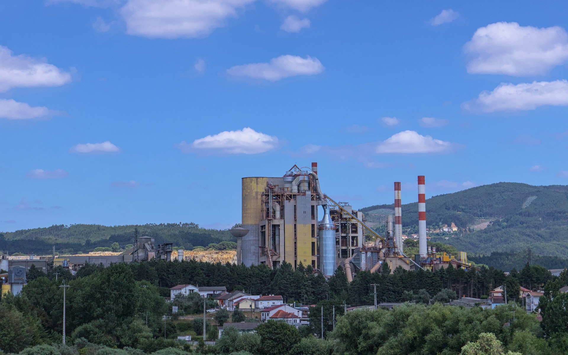 a factory with smokestacks