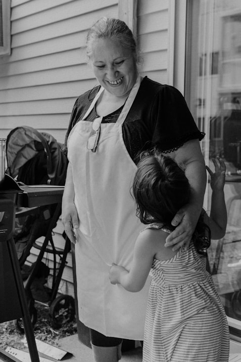 a person holding a child