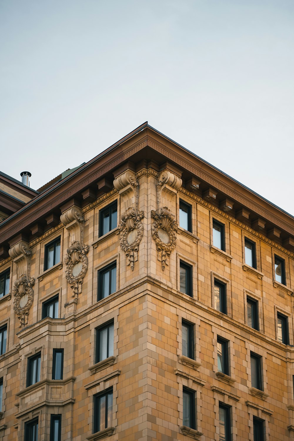 a building with a statue on the roof