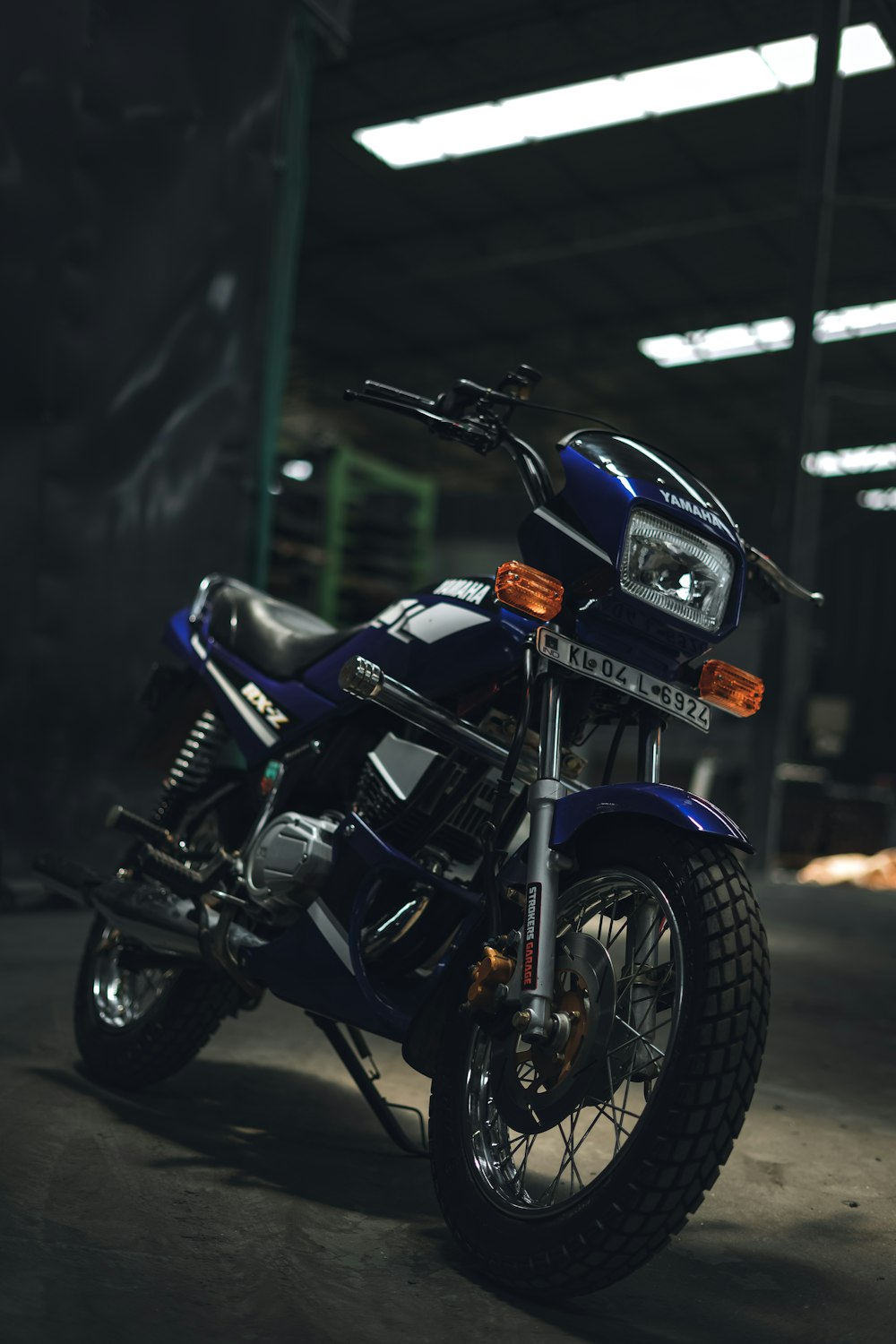 a motorcycle parked in a garage