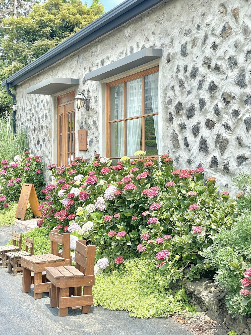 a house with a garden of flowers