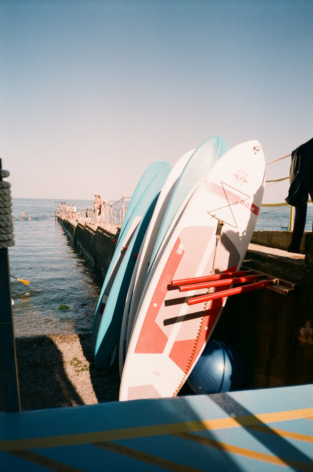 a surfboard on a dock