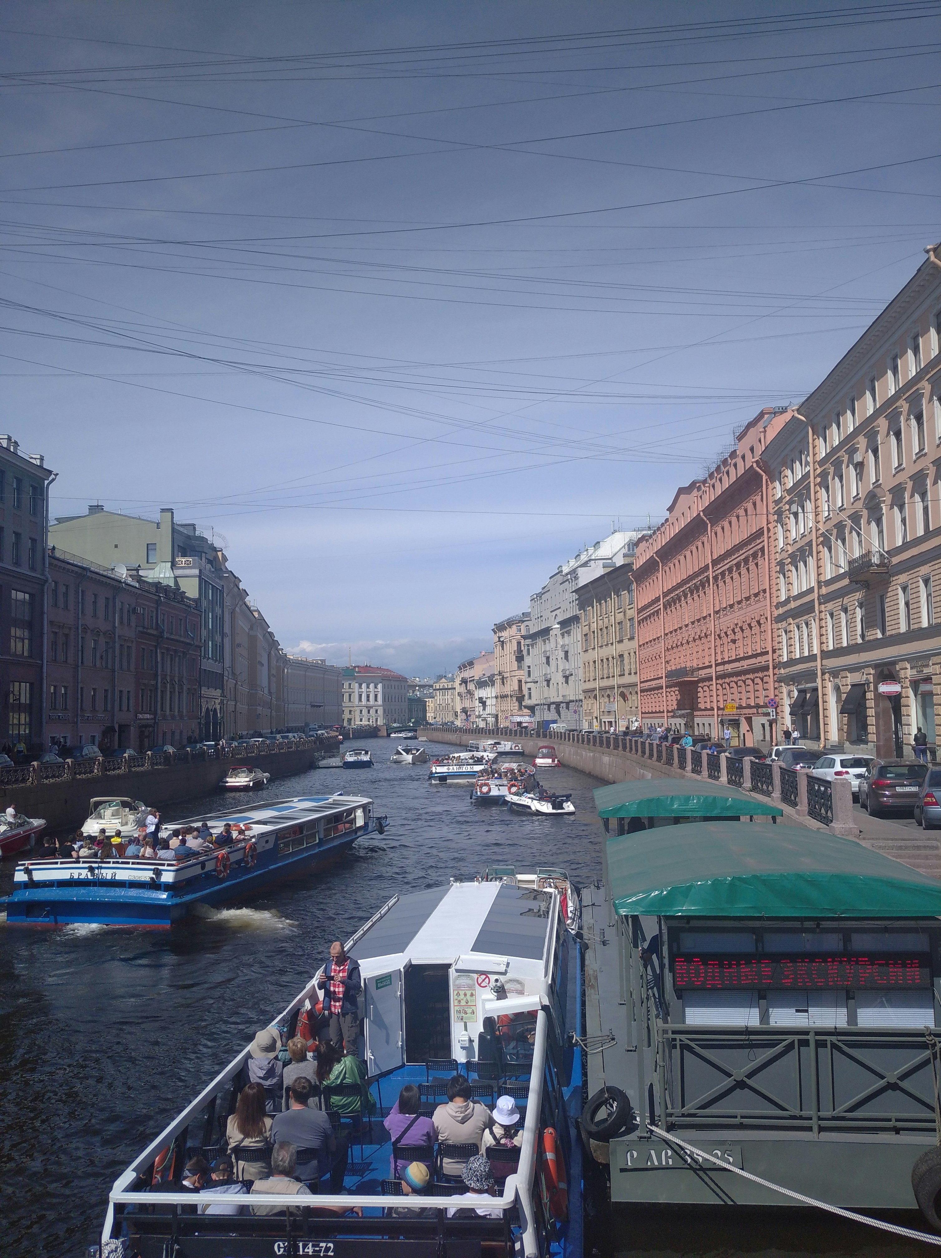 a river with boats and people