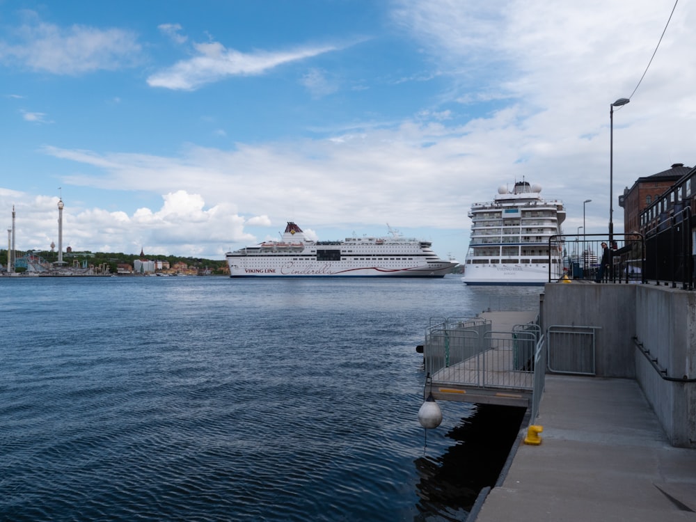 a couple of cruise ships in a harbor