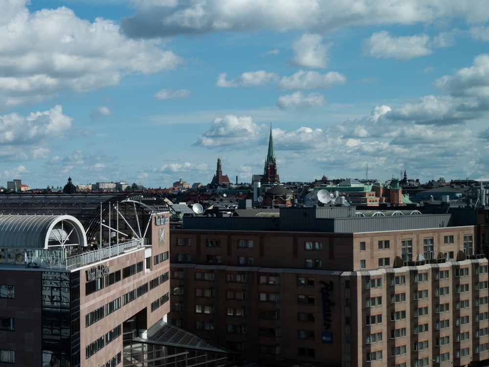 a group of buildings with a blue sky above