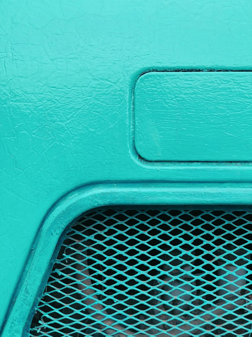 a close up of a car's grill